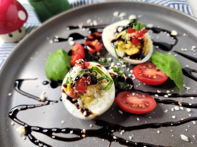 Tomato and Feta Deviled Egg with Balsamic Glaze