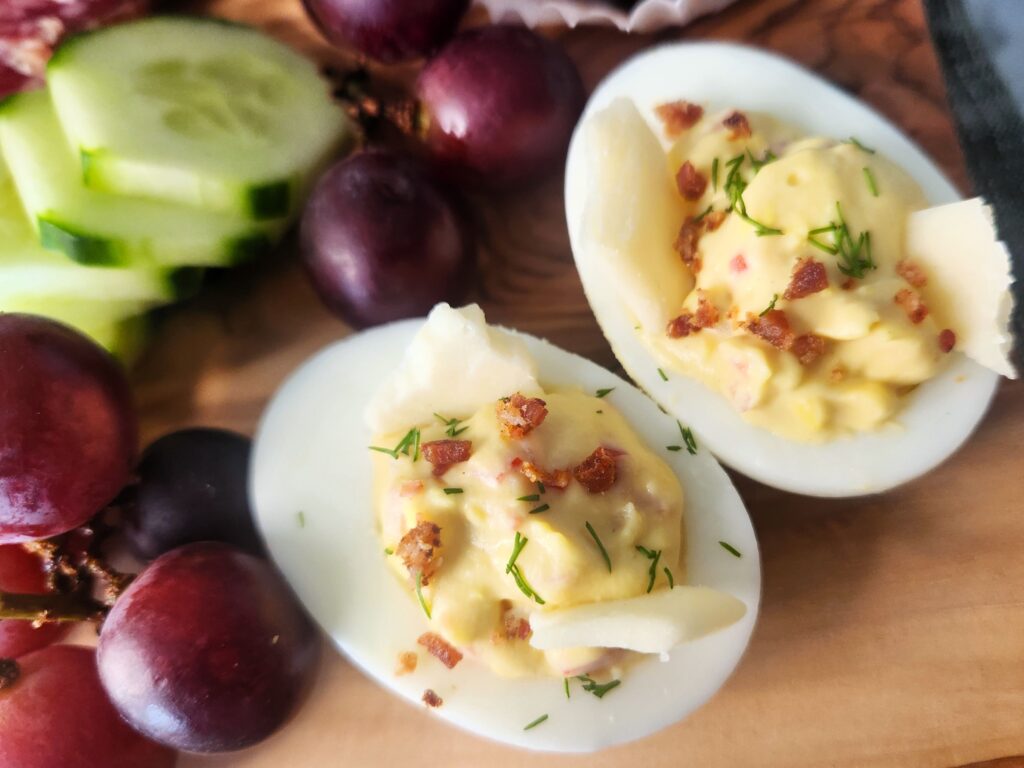 Zippy Bell Pepper Deviled Eggs featured on our Kick'n Kitchen's Ultimate Charcuterie Board