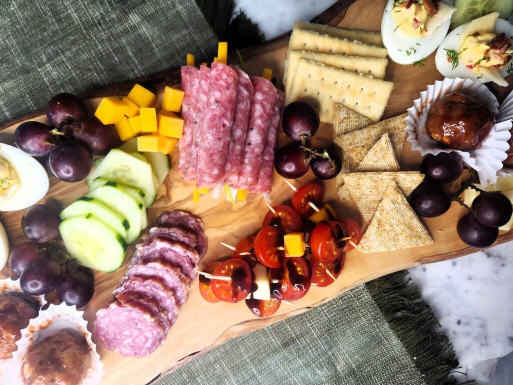 Kick'n Kitchen's Ultimate Charcuterie Board ready for your next party or gathering.