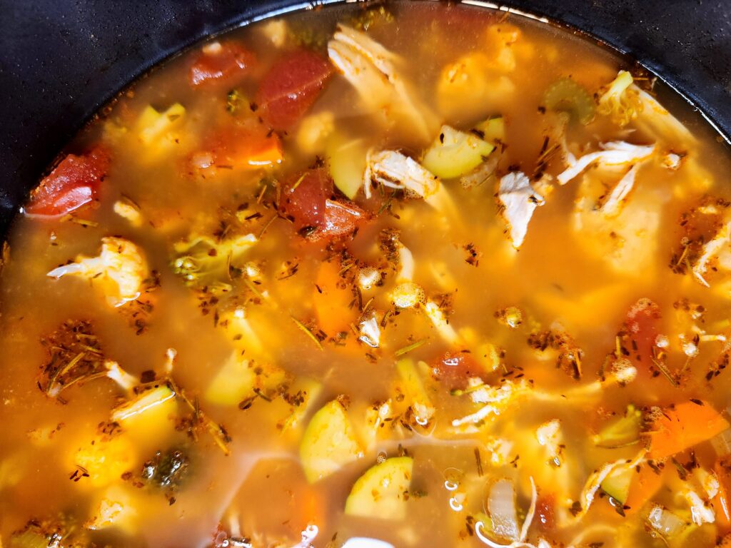 Add remaining ingredients and allow to simmer, Chicken and Orzo Vegetable Soup