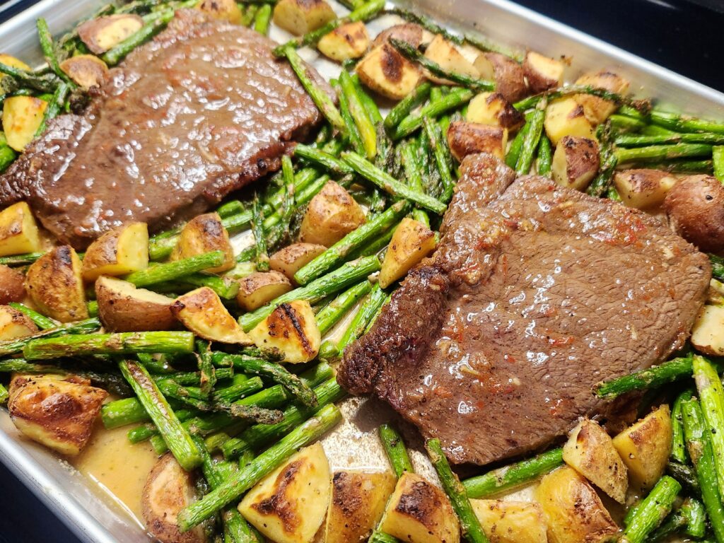 Remove Sheet Pan Steak and Veggie Dinner from the oven
